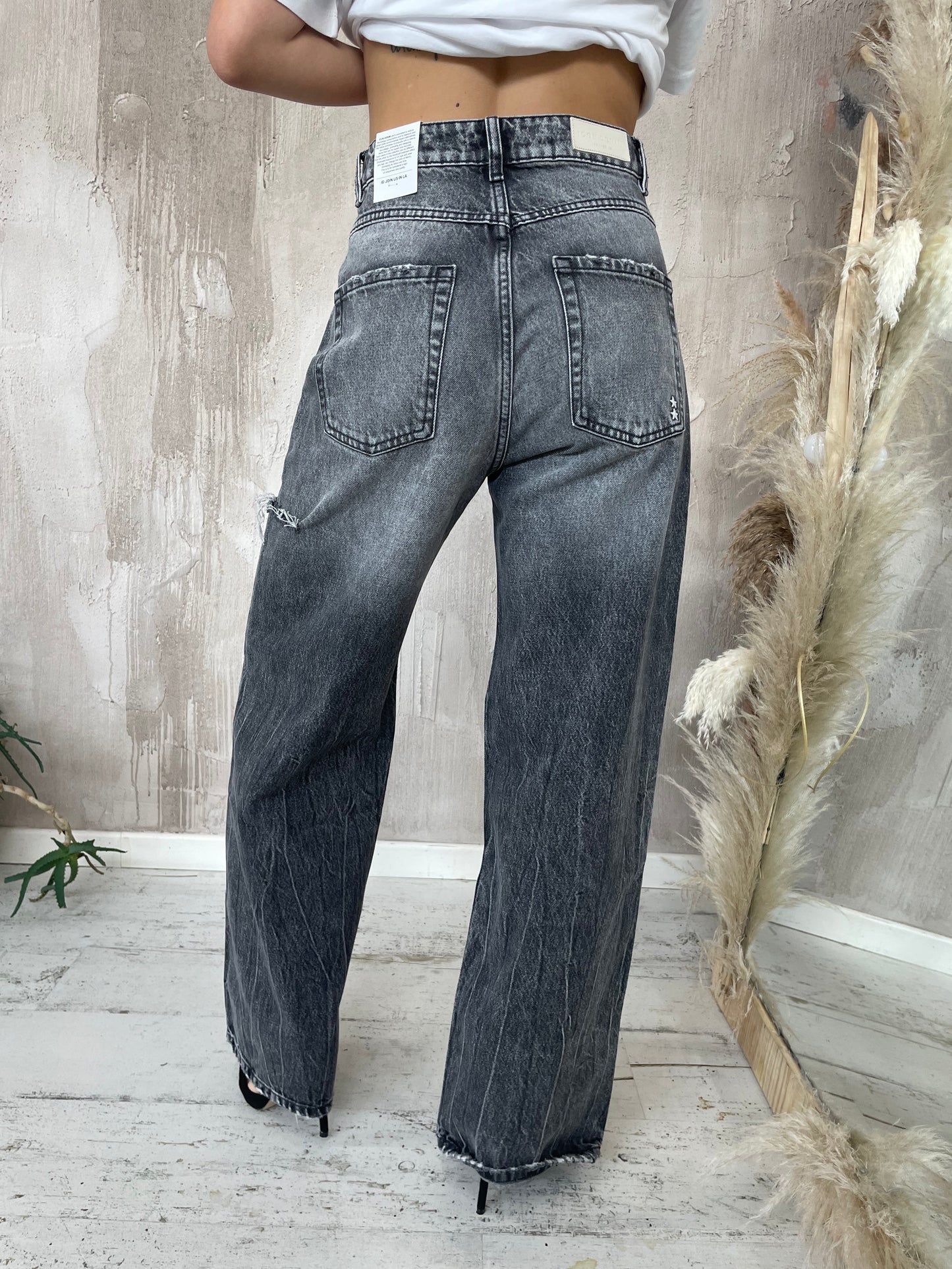 Jeans "Poppy" lavaggio scuro con rotture